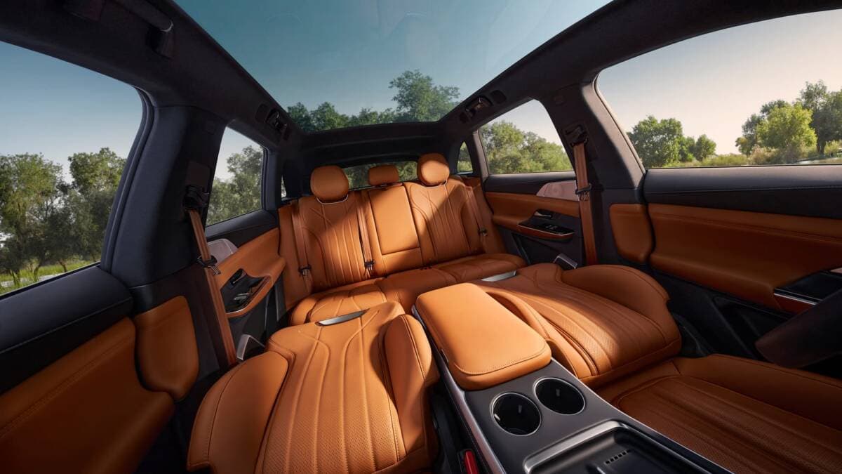 XPeng car interior with leather trim, center console, and multimedia system