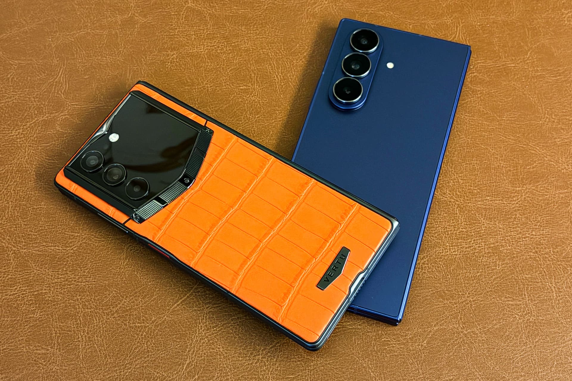 Vertu’s Alphafold with a calfskin leather back and Samsung’s Galaxy Z Fold 7 with a glass back — Image Credits: Jagmeet Singh / TechCrunch