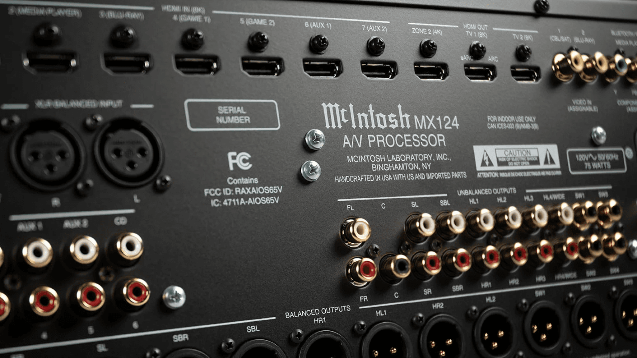 Promotional photo of the McIntosh MX124 A/V Processor showing some of the many connections on the rear