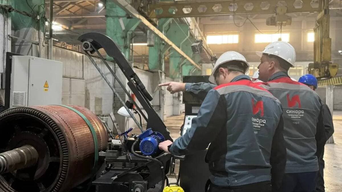 Workers at the CNC station for traction motors of 2ES6 electric locomotives