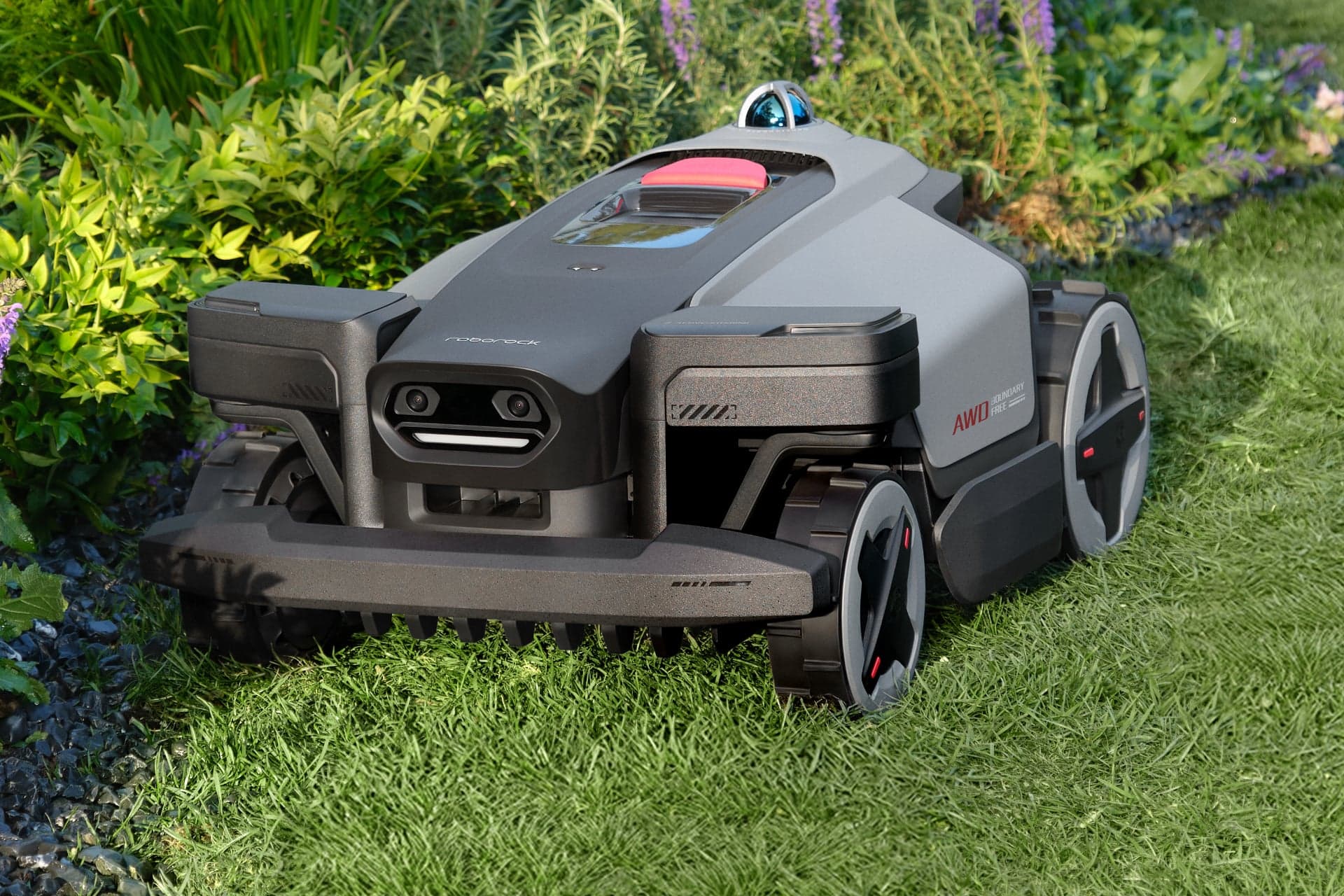 RockMow X120H mowing near a garden