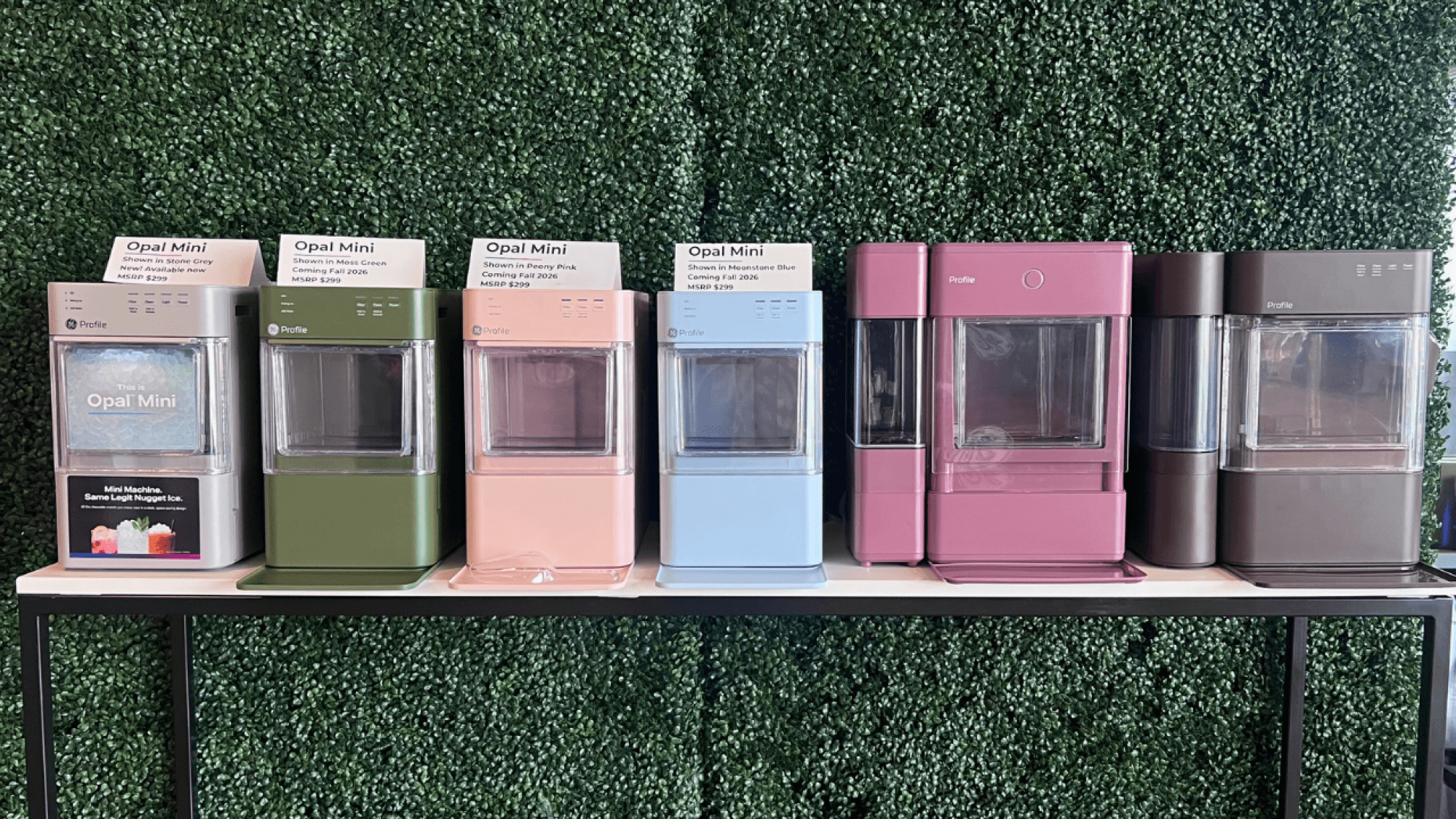 Opal Mini ice makers in grey, green, pink, and blue next to Opal Ultra ice makers in raspberry and grey.
