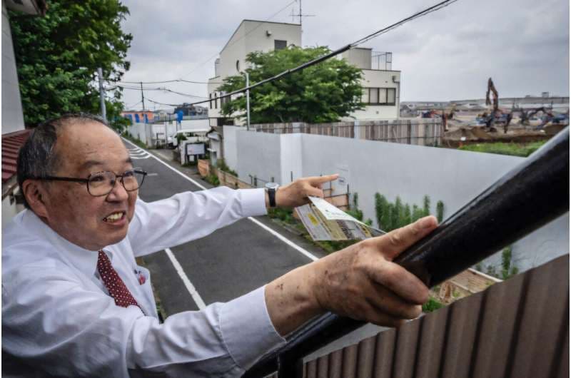 Some Hino residents like 69-year-old Yasuo Yamazaki worry the data center could cause problems like fires